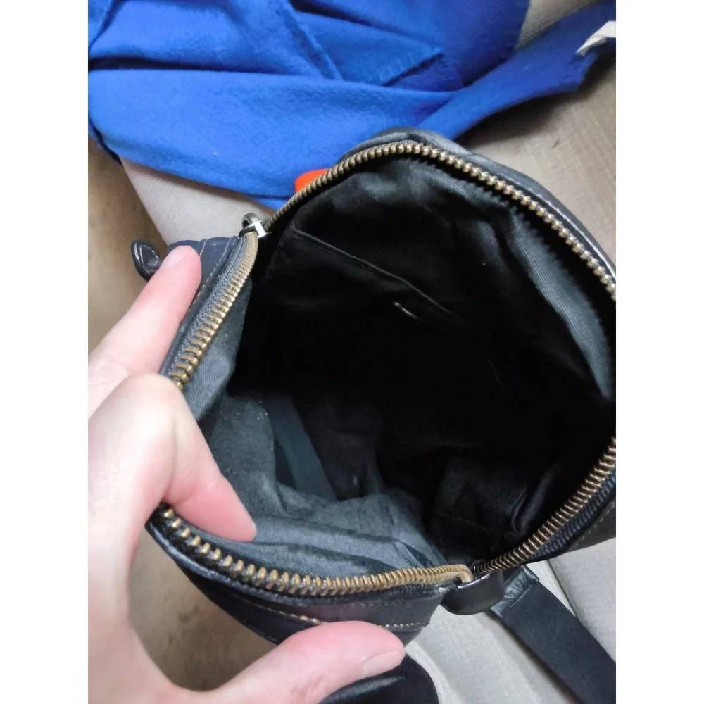 26. Coach Charles Pack Black Leather Sling Crossbody Bag F37598